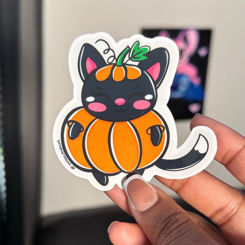 Image of Nyoka in a Pumpkin Costume 