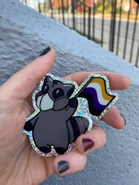 Image 3 of nonbinary pride raccoon (glitter)