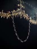 Image 1 of a precious throat choker