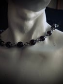 Image 7 of a precious throat choker