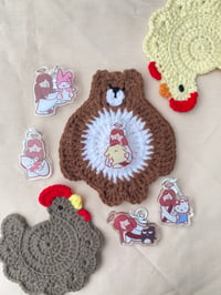 JESUS SANRIO KEYCHAINS