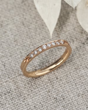 Image of 18ct yellow gold white diamond semi eternity ring