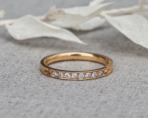 Image of 18ct yellow gold white diamond semi eternity ring