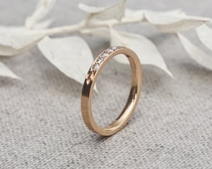 Image of 18ct yellow gold white diamond semi eternity ring