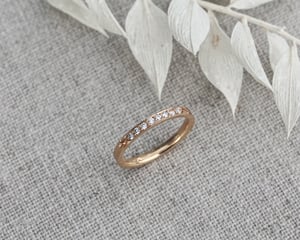 Image of 18ct yellow gold white diamond semi eternity ring