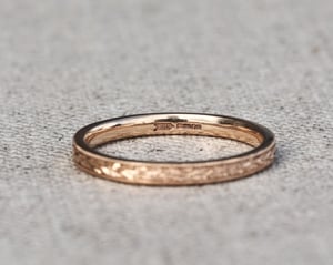 Image of 18ct rose gold, 2mm flat court, laurel leaf and milled edge engraved ring