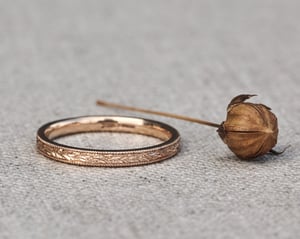 Image of 18ct rose gold, 2mm flat court, laurel leaf and milled edge engraved ring