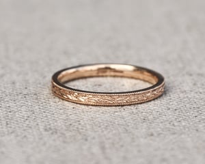 Image of 18ct rose gold, 2mm flat court, laurel leaf and milled edge engraved ring