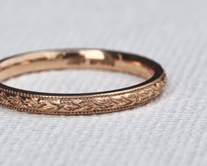 Image of 18ct Rose gold 2mm laurel leaf and milled edge engraved ring