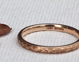 Image of 18ct Rose gold 2mm laurel leaf and milled edge engraved ring