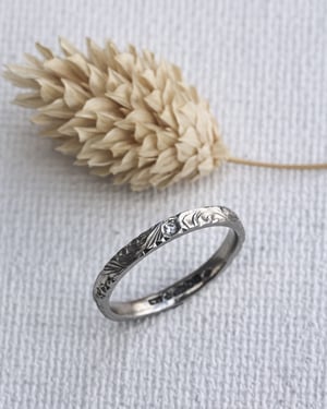 Image of Platinum 2mm flat court floral engraved ring