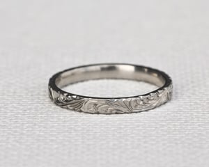 Image of Platinum 2mm flat court floral engraved ring