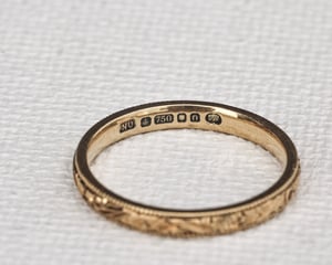 Image of 18ct Yellow gold, 2mm flat court, Floral and milled edge engraved ring