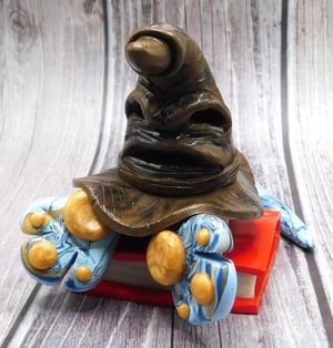 Image of Albus the Mini Mon and Sorting Hat