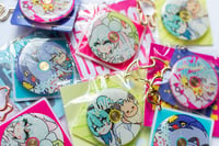 Image 1 of PKMN × MIKU || SPINNING KEYCHARM