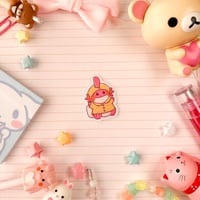 Image 3 of Small Pink Raincoat Mudkip Axolotl Vinyl Sticker