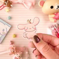 Image 4 of Acrylic Glitter Pink Cinna Cinnamon Roll Puppy Keychain