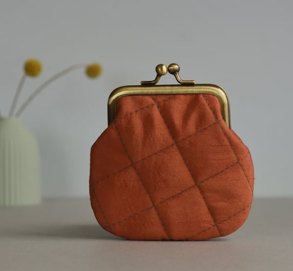 Image of Madder, red/orange quilted silk kisslock purse, dyed with plants