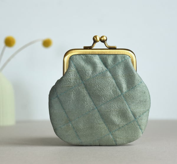 Image of Indigo leaf, pale blue quilted silk kisslock purse, dyed with plants