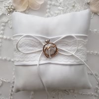 Image 1 of White Satin Ring Bearer Pillow with Layered Lace and Emblem Accent