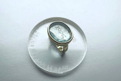 Image of Xαρις / beauty, glory, favour, honour, reward electrum ring with aquamarine