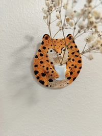 Image 2 of Leopard and vase