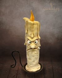 Image 1 of Grumpy Candle