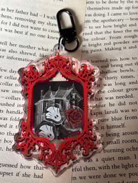 Image 1 of Officially licensed haunting Adeline shaker acrylic keychain 