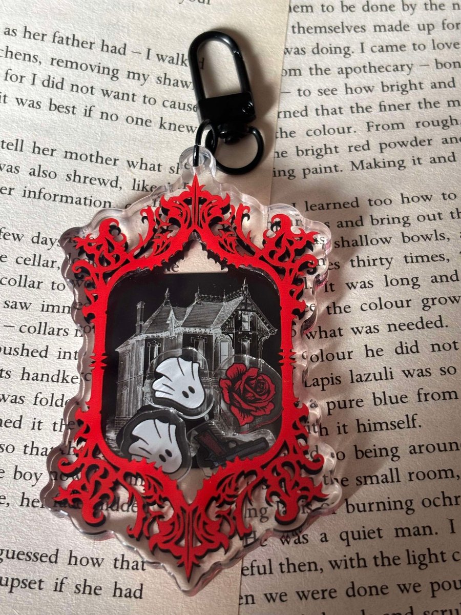 Image of Officially licensed haunting Adeline shaker acrylic keychain 