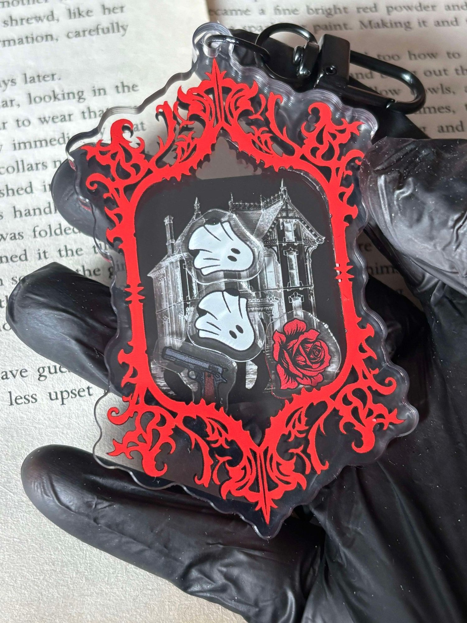 Image of Officially licensed haunting Adeline shaker acrylic keychain 