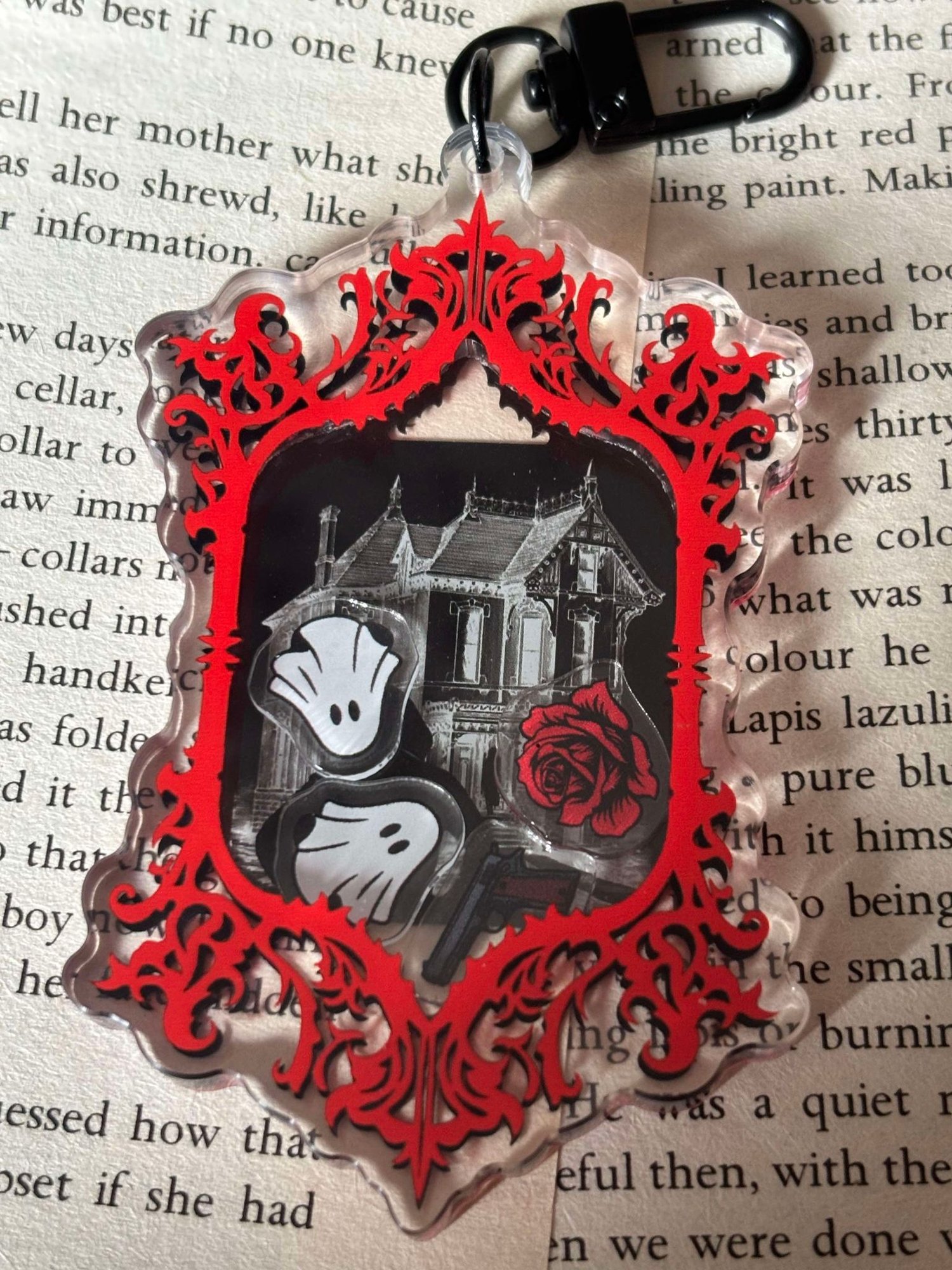 Image of Officially licensed haunting Adeline shaker acrylic keychain 
