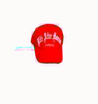 Image 1 of Red L.A.M snapback trucker hat
