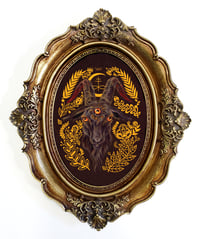 Image 1 of Black Goat in antiqued oval frame