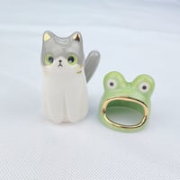 Image 3 of Gray and white cat with frog hat ceramic figurine