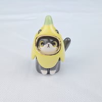 Image 1 of Banana Tuxedo Cat Ceramic Figurine 