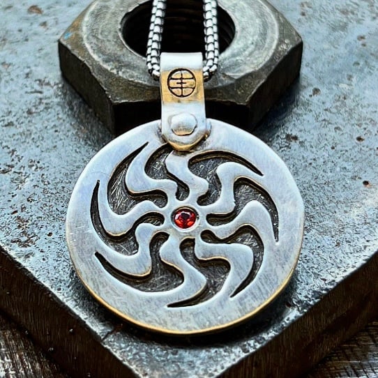 Image of Silver Sun with Orange Sapphire