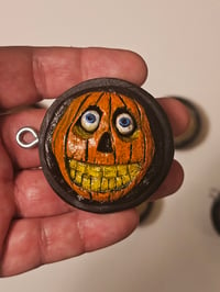 Image 2 of "Bottlecap Removal Device" (jackolantern)