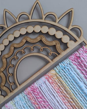 Image of Large wooden boho style woolen hanging