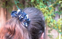 Image 1 of ollie glow in the dark espooky scrunchie