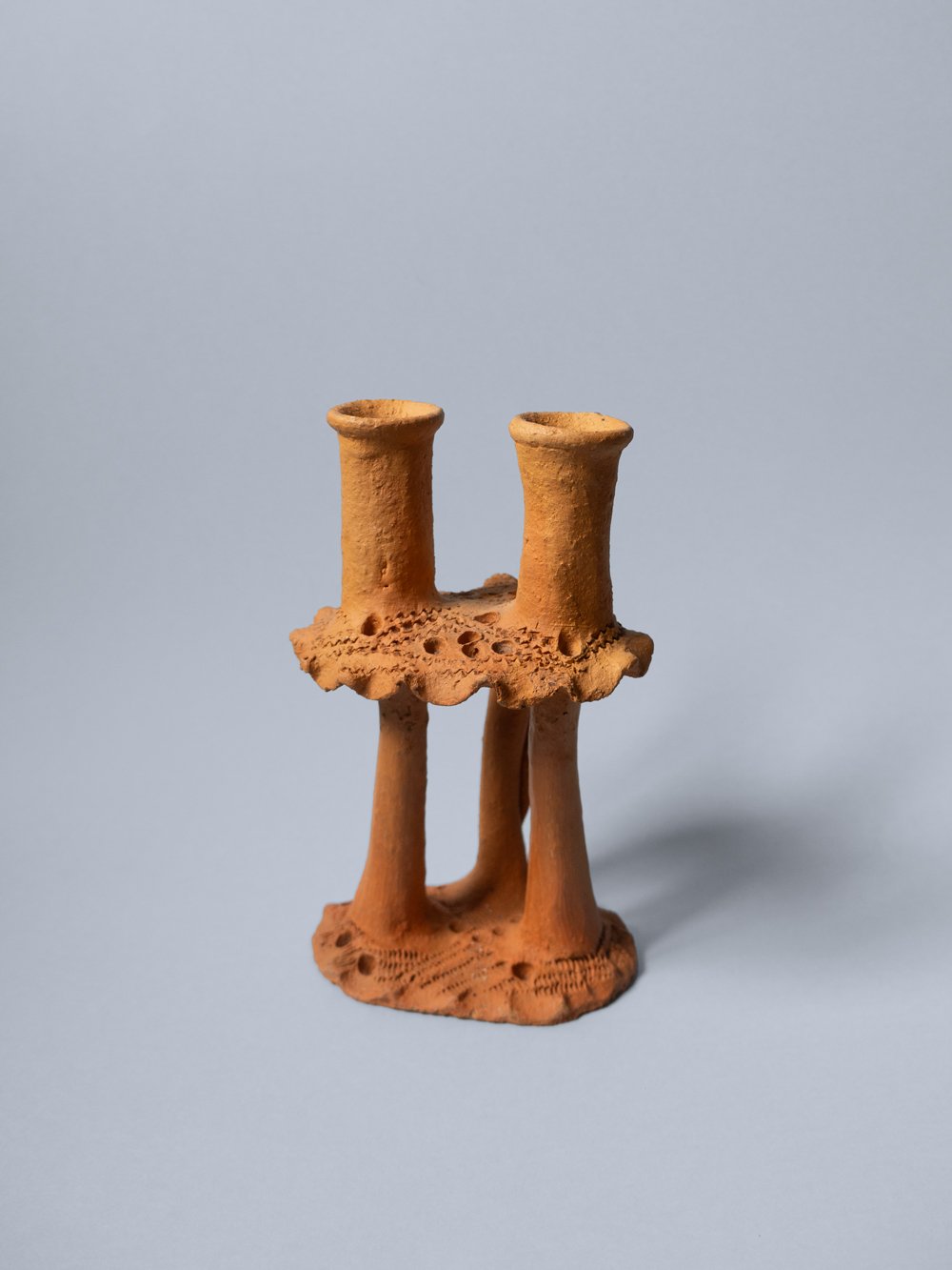 Image of clay candlestick