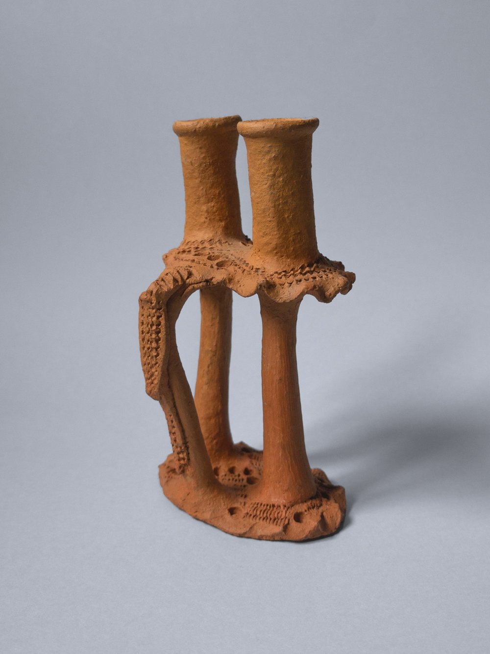 Image of clay candlestick