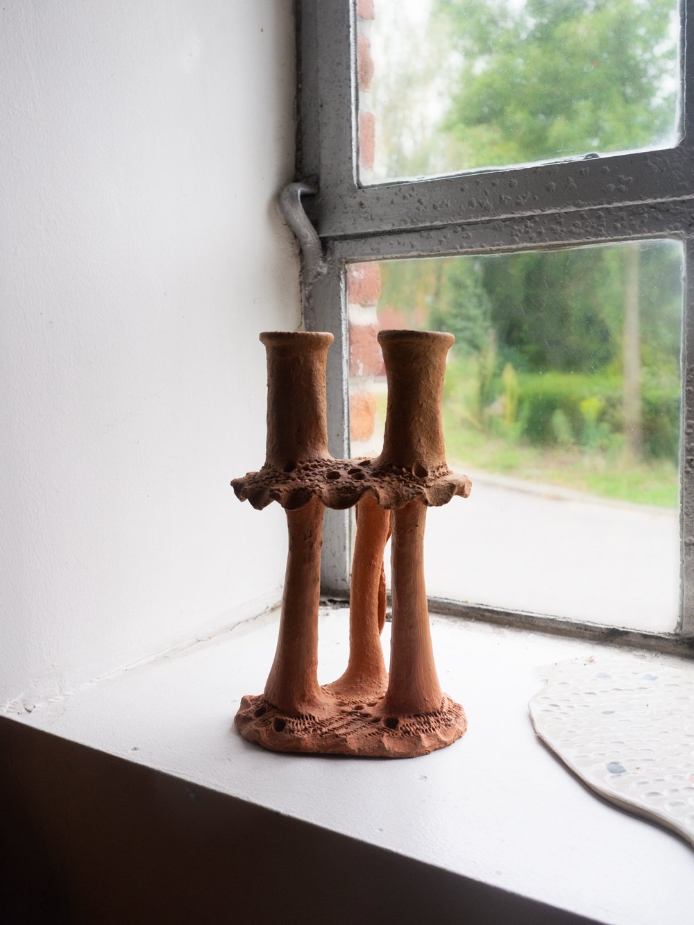 Image of clay candlestick