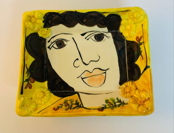 Image of Oblong yellow face dish 