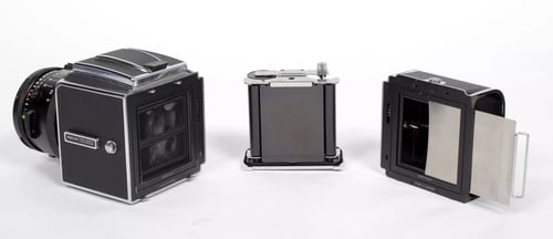 Image of Hasselblad 500C/M camera w/ Planar T* 80mm F2.8 CF lens + A12 Back + WLF #4218