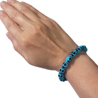 Image 1 of Blue Skull Bracelet (Size Small)