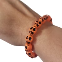 Image 2 of Orange Skull Bracelet  (Size Small)