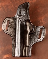 Image 2 of 5" 1911 Blacked out hand textured OWB holster.