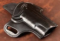Image 4 of 5" 1911 Blacked out hand textured OWB holster.
