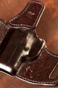 Image 4 of SIg P365 hand textured and tooled Black Cherry OWB holster.