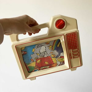 Image of Boîte à musique télévision Snoopy MOB années 80